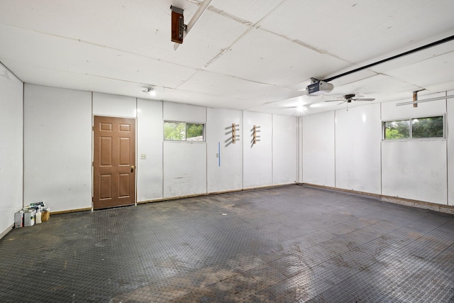 20170 Oxboro Ln N, Scandia, MN 55047 - garage featuring a garage door opener and a ceiling fan