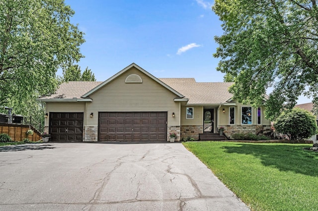 11847 Meadow Curv, Lindstrom, MN 55045 - single story home with driveway, an attached garage, a front yard, stone siding, and a shingled roof