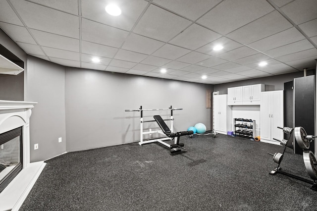 11847 Meadow Curv, Lindstrom, MN 55045 - workout area featuring recessed lighting and a glass covered fireplace