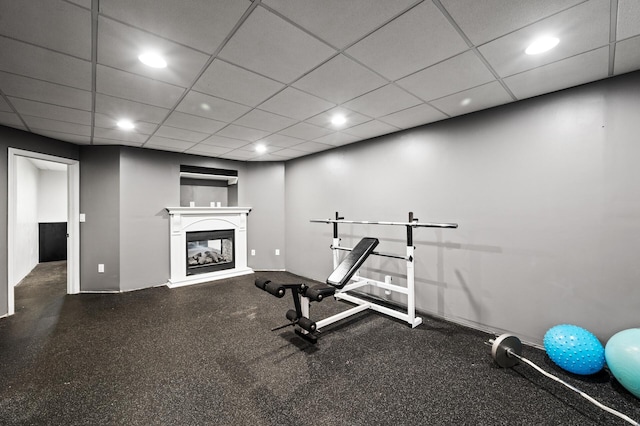 11847 Meadow Curv, Lindstrom, MN 55045 - workout area with recessed lighting, a glass covered fireplace, and a drop ceiling