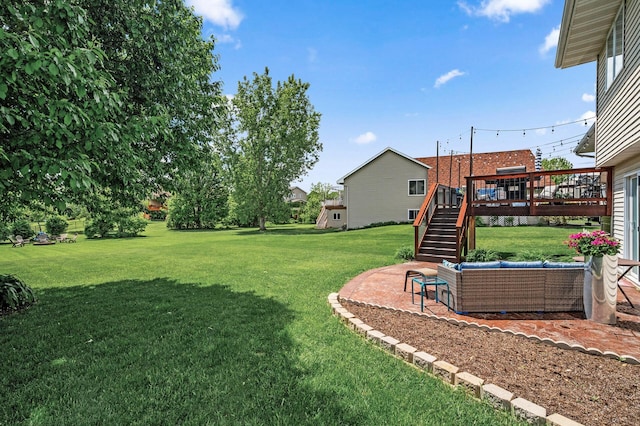 11847 Meadow Curv, Lindstrom, MN 55045 - view of green lawn with stairway, a deck, and a patio