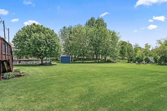 11847 Meadow Curv, Lindstrom, MN 55045 - view of green lawn featuring a shed