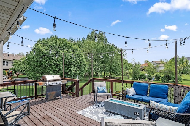 11847 Meadow Curv, Lindstrom, MN 55045 - wooden deck featuring an outdoor living space with a fire pit, grilling area, and a yard
