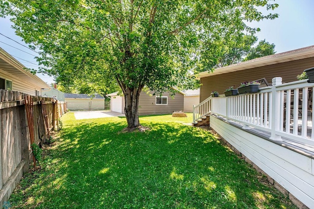 105 5th Ave W, West Fargo, ND 58078 - view of yard with a garage and an outdoor structure