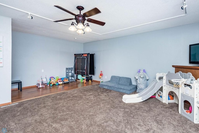 105 5th Ave W, West Fargo, ND 58078 - recreation room with a ceiling fan and carpet flooring