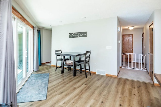 105 5th Ave W, West Fargo, ND 58078 - dining space featuring wood finished floors and baseboards