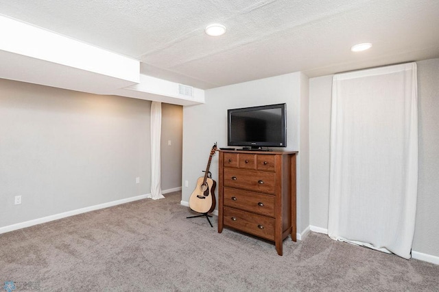 105 5th Ave W, West Fargo, ND 58078 - finished below grade area with carpet, recessed lighting, and a textured ceiling