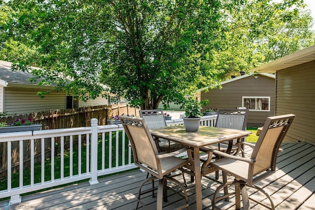 105 5th Ave W, West Fargo, ND 58078 - wooden terrace featuring outdoor dining space