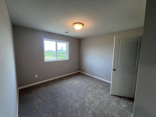 2488 Jacamar Ave NE, Saint Michael, MN 55376 - spare room featuring carpet flooring and baseboards