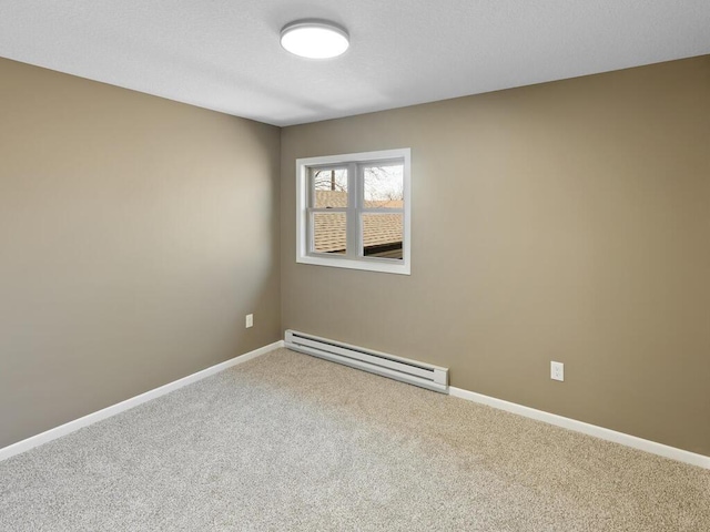 26161 8th St W, Zimmerman, MN 55398 - empty room with a baseboard heating unit and carpet