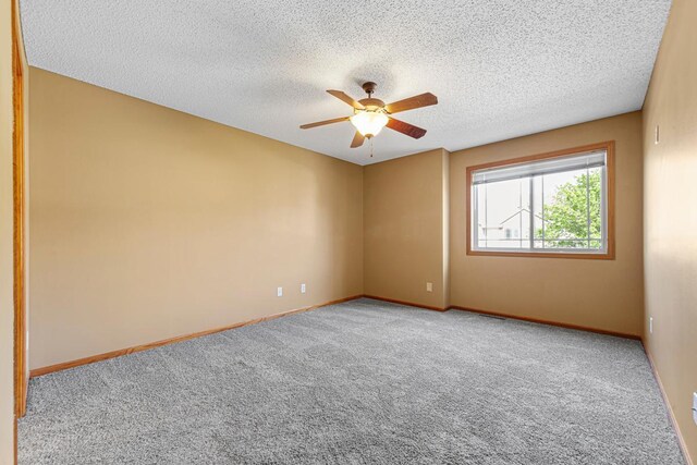 3014 Pebble Beach Dr, Faribault, MN 55021 - carpeted empty room with ceiling fan and a textured ceiling