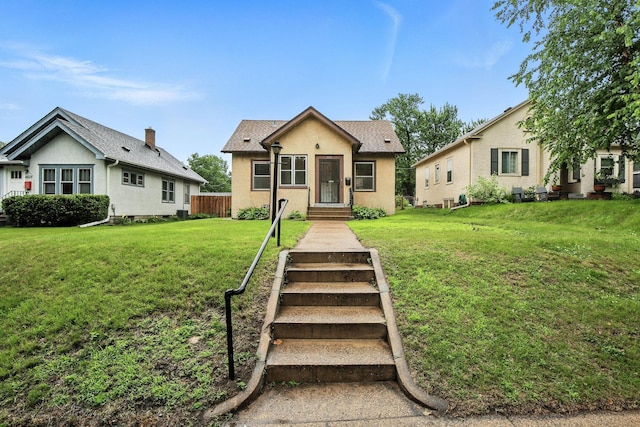 4529 17th Ave S, Minneapolis, MN 55407 - bungalow-style home featuring stucco siding