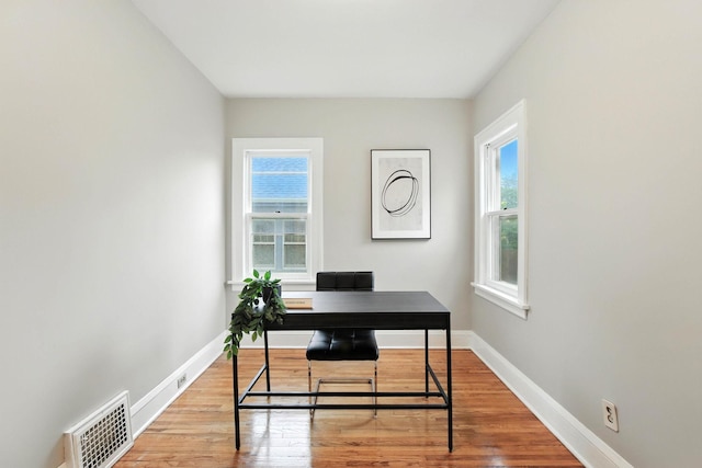 4529 17th Ave S, Minneapolis, MN 55407 - home office with healthy amount of natural light and wood finished floors