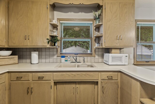 5524 34th Ave S, Minneapolis, MN 55417 - kitchen featuring white microwave, open shelves, light countertops, and tasteful backsplash