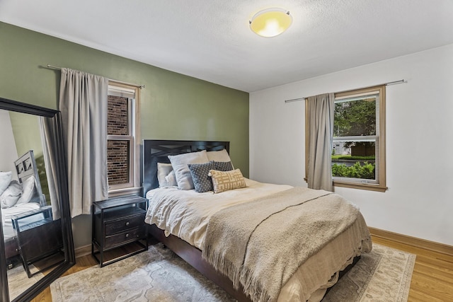 5524 34th Ave S, Minneapolis, MN 55417 - bedroom with light wood-style floors and baseboards