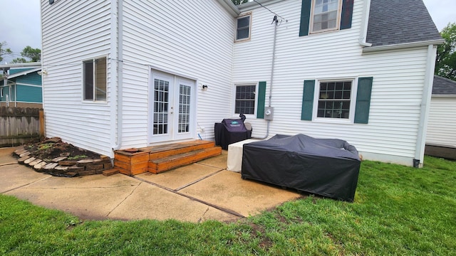 717 2nd Ave SW, Pipestone, MN 56164 - rear view of property with french doors, a shingled roof, and a patio