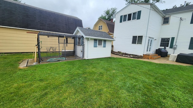 717 2nd Ave SW, Pipestone, MN 56164 - back of property with an outbuilding and roof with shingles