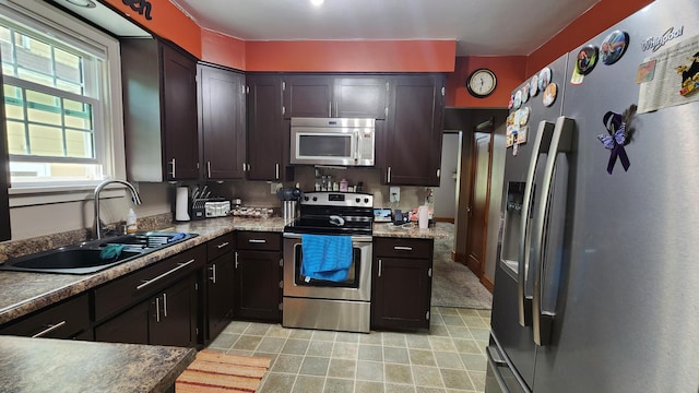 717 2nd Ave SW, Pipestone, MN 56164 - kitchen featuring stainless steel appliances and a sink