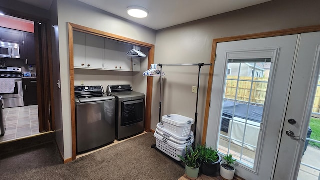 717 2nd Ave SW, Pipestone, MN 56164 - laundry area with cabinet space, independent washer and dryer, and carpet