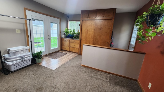 717 2nd Ave SW, Pipestone, MN 56164 - entryway featuring carpet flooring and baseboards