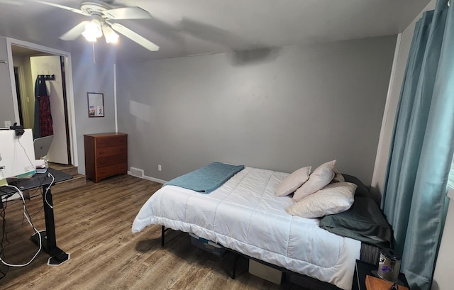 717 2nd Ave SW, Pipestone, MN 56164 - bedroom with wood finished floors and a ceiling fan