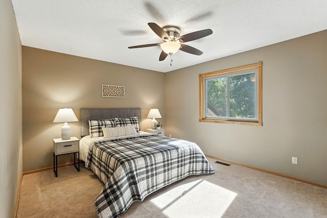 14226 310th Ave, Princeton, MN 55371 - carpeted bedroom with baseboards and ceiling fan
