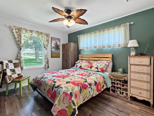 34 Shady Rest Rd, Lake Sarah Twp, MN 56132 - bedroom with wood finished floors and ceiling fan