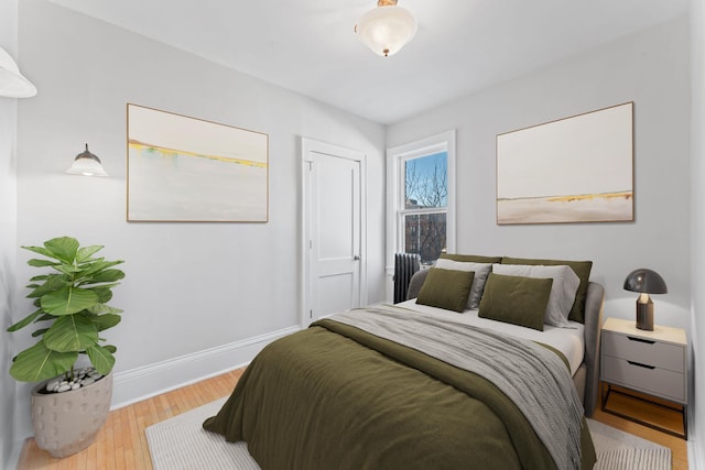 2218 Nicollet Ave Unit 22, Minneapolis, MN 55404 - bedroom with wood finished floors and baseboards
