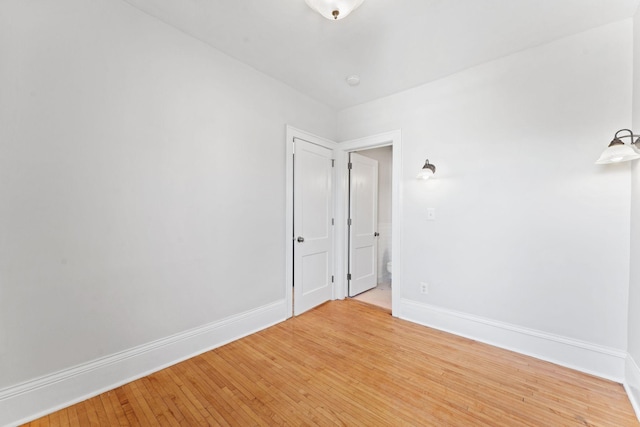2218 Nicollet Ave Unit 22, Minneapolis, MN 55404 - unfurnished room featuring baseboards and light wood-style floors