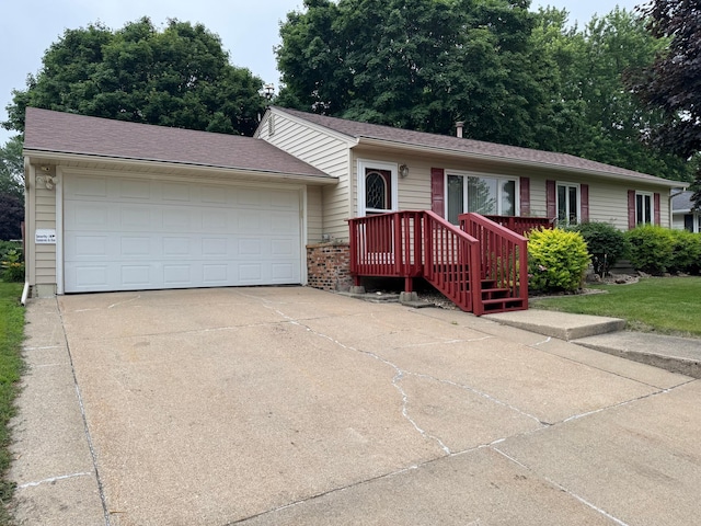 1204 Garflield Ave, Albert Lea, MN 56007 - ranch-style home with concrete driveway and an attached garage