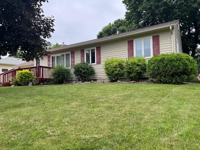 1204 Garflield Ave, Albert Lea, MN 56007 - single story home featuring a front yard and a wooden deck