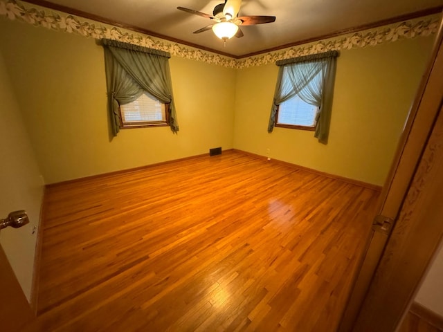 1204 Garflield Ave, Albert Lea, MN 56007 - unfurnished room with wood finished floors and a ceiling fan