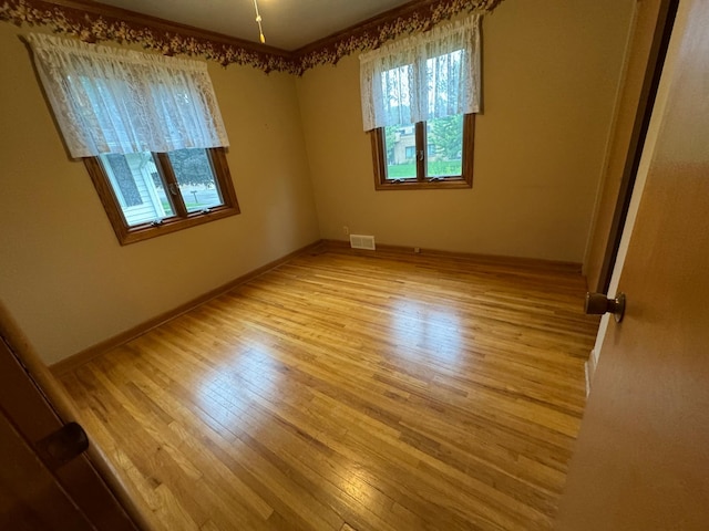 1204 Garflield Ave, Albert Lea, MN 56007 - unfurnished room with wood finished floors and baseboards