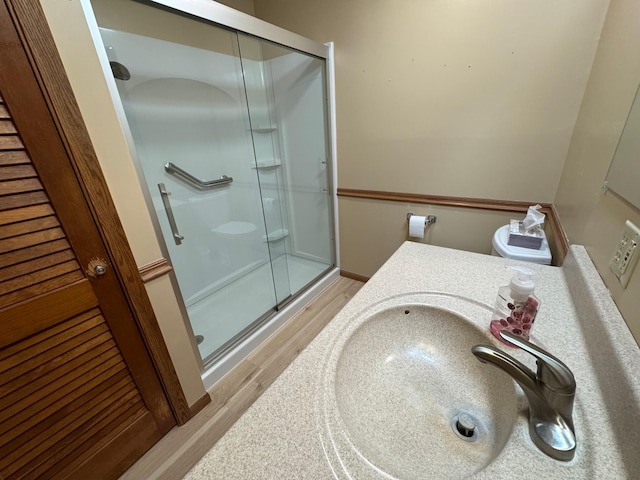 1204 Garflield Ave, Albert Lea, MN 56007 - bathroom featuring a shower stall and wood finished floors
