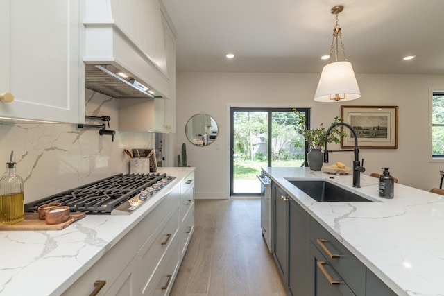 625 Ivy Falls Ave, Mendota Heights, MN 55118 - kitchen featuring appliances with stainless steel finishes, recessed lighting, light wood-type flooring, custom exhaust hood, and plenty of natural light