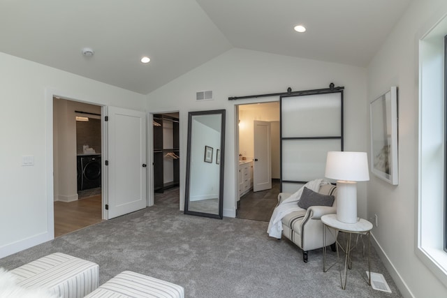 625 Ivy Falls Ave, Mendota Heights, MN 55118 - sitting room with washer / clothes dryer, vaulted ceiling, carpet flooring, a barn door, and recessed lighting