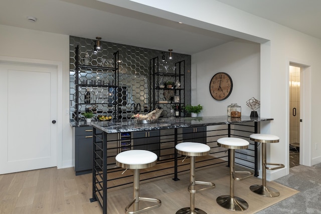 625 Ivy Falls Ave, Mendota Heights, MN 55118 - indoor wet bar with wood finished floors