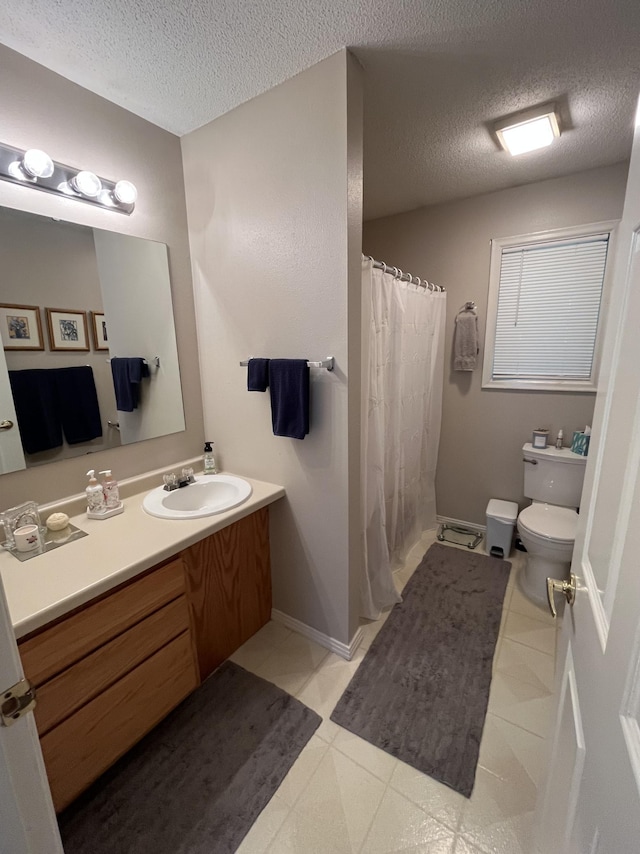 15965 Red Sand Cir, Brainerd, MN 56401 - full bathroom with vanity, a textured ceiling, tile patterned flooring, and curtained shower