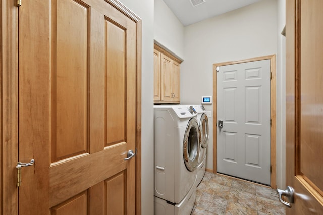 11880 Dunkirk Cir NE, Blaine, MN 55449 - washroom with separate washer and dryer and cabinet space