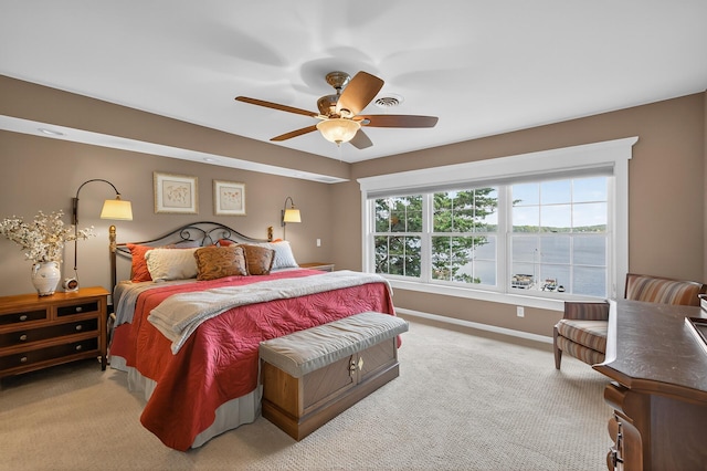7471 260th St, Wyoming, MN 55092 - bedroom with light carpet and a ceiling fan