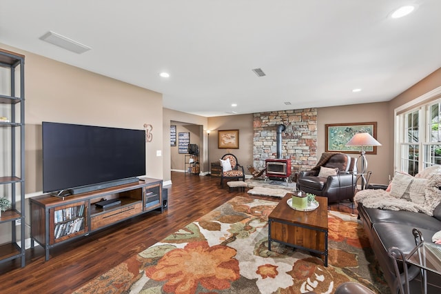 7471 260th St, Wyoming, MN 55092 - living area with wood finished floors, a wood stove, and recessed lighting
