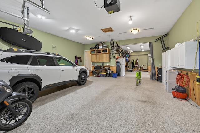 7471 260th St, Wyoming, MN 55092 - garage featuring a garage door opener