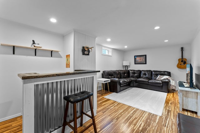 6071 Red Fox Run, North Branch, MN 55056 - living area featuring a dry bar, wood finished floors, and recessed lighting