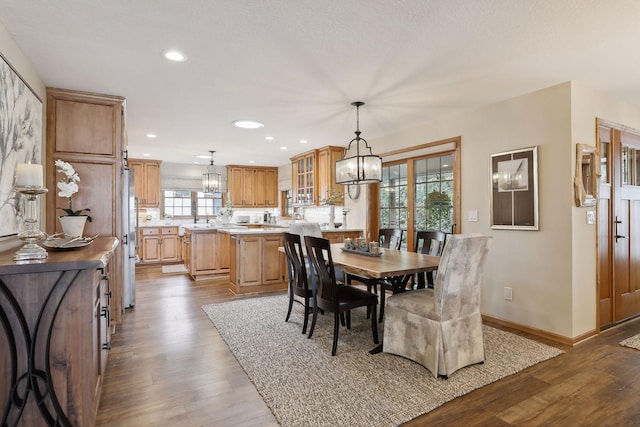 9525 Shore Trl N, Forest Lake, MN 55025 - dining space featuring dark wood-type flooring, a chandelier, and recessed lighting