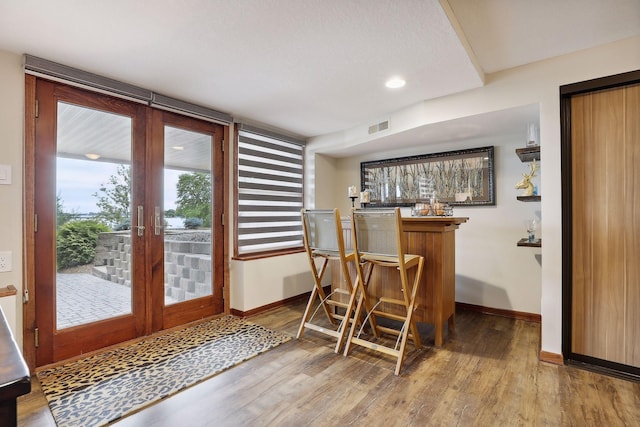 9525 Shore Trl N, Forest Lake, MN 55025 - indoor wet bar featuring wood finished floors, french doors, and recessed lighting