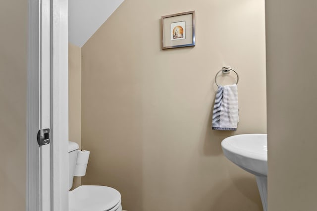 15618 Emerald Dr N Unit 2, Hugo, MN 55038 - bathroom with toilet and vaulted ceiling