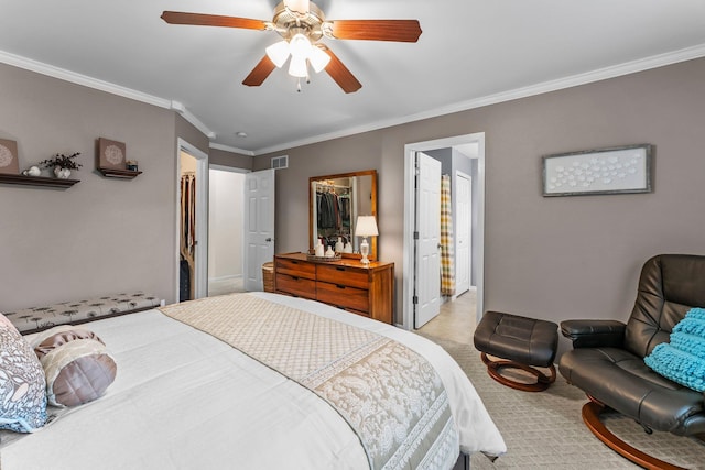 15618 Emerald Dr N Unit 2, Hugo, MN 55038 - bedroom with ornamental molding, carpet, a ceiling fan, a walk in closet, and a closet