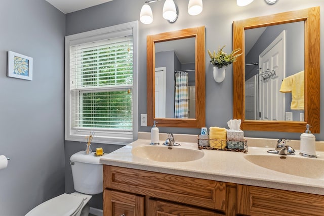 15618 Emerald Dr N Unit 2, Hugo, MN 55038 - bathroom featuring double vanity and toilet