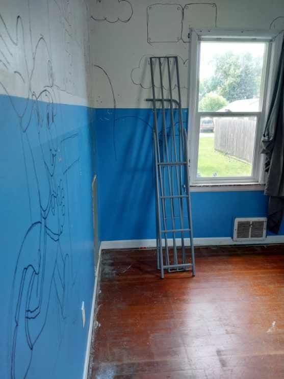 206 20th St S, Benson, MN 56215 - empty room featuring wood finished floors