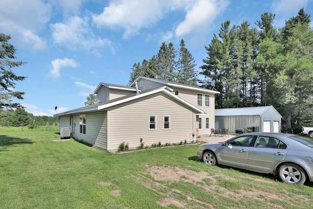 75309 Twin Oaks Rd, Bremen Twp, MN 55735 - view of property exterior with a lawn and an outbuilding